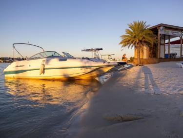 Boat at Flora-Bama Yacht Club waterfront restaurant in Orange Beach